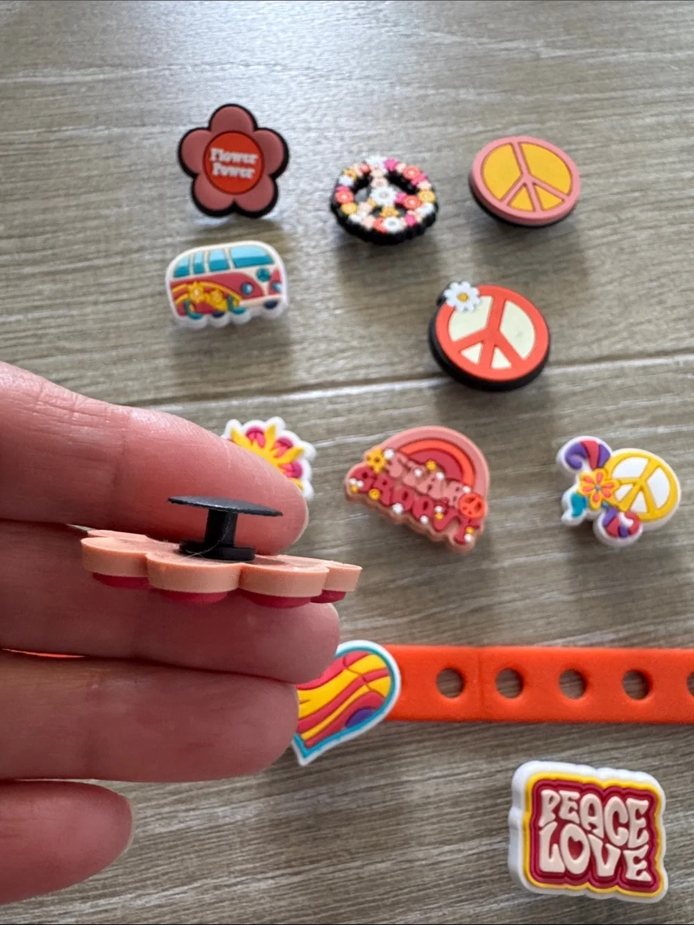 Kids Orange Snap Bracelet with Peace & Flower Charms